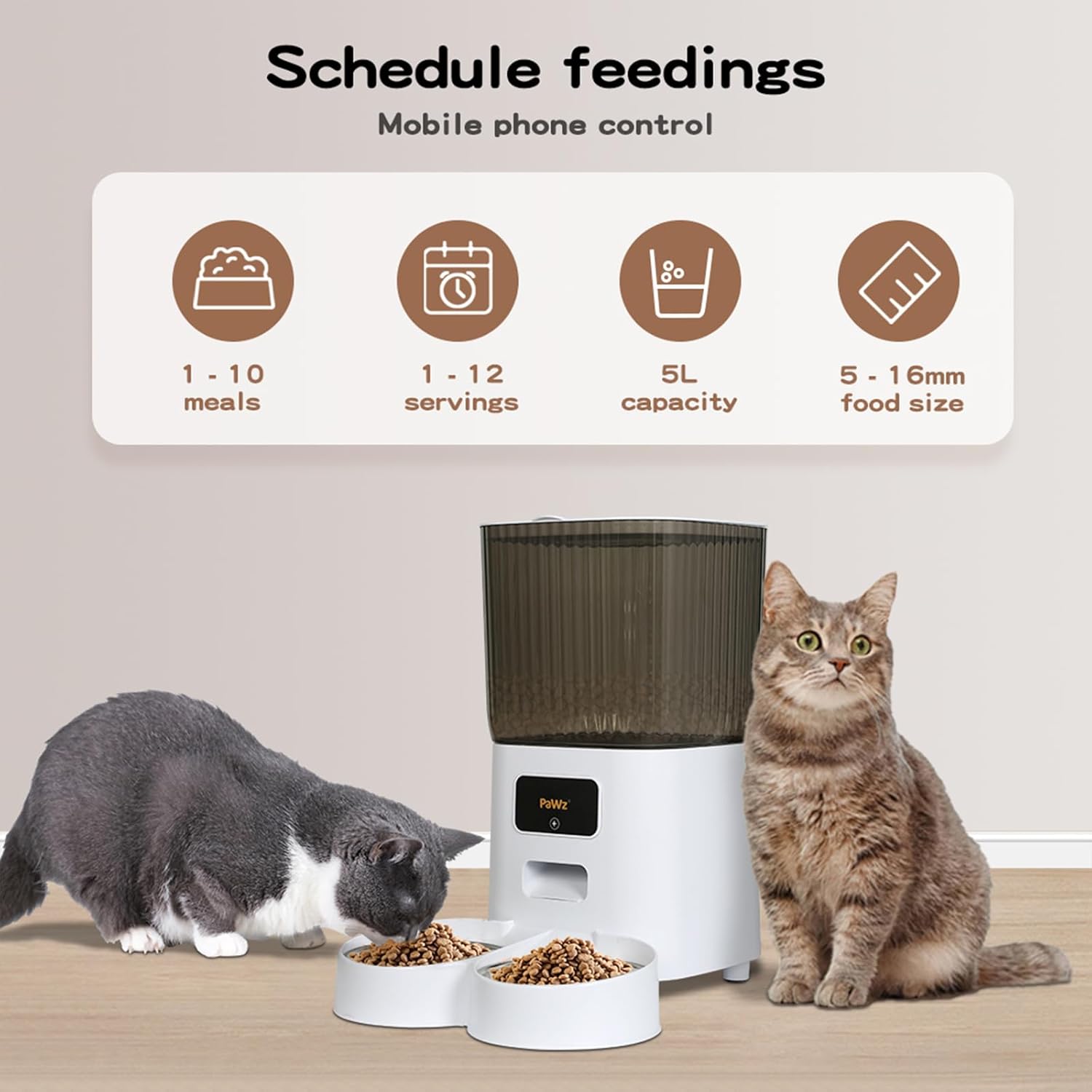 An automatic pet feeder shown with two cats in a home-like setting. The feeder is white with a dark gray hopper and a small digital display at Pet Servo