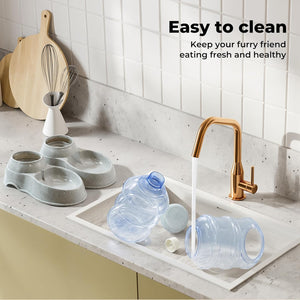Dog water bottles being washed in a kitchen sink with text about easy cleaning at Pet Servo