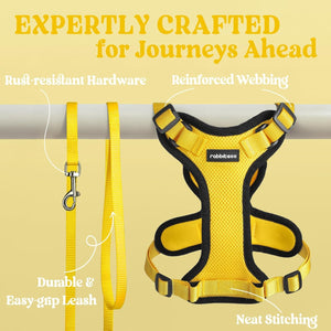 Yellow dog harness and leash set with text highlighting features on a beige background at Pet Servo