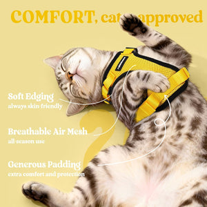 Cat wearing a yellow harness with text highlighting features on a yellow background at Pet Servo