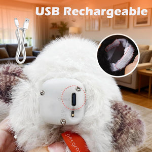 Plush toy with USB charging port and cable, set against a blurred indoor background at Pet Servo