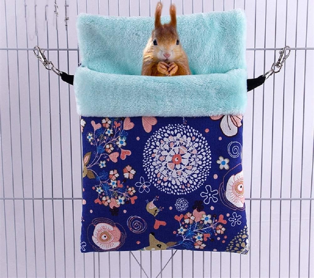 Squirrel inside a floral-patterned hammock hanging from a cage at Pet Servo