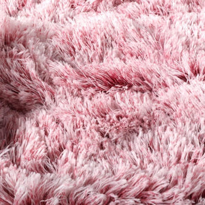 Close-up of a pink fluffy fabric texture at Pet Servo