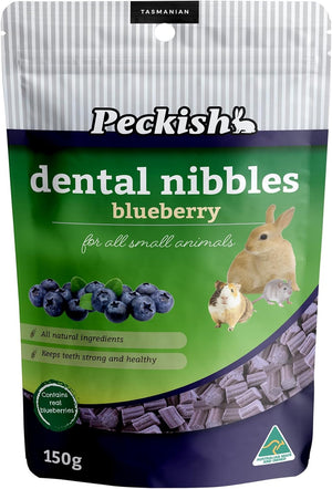 Package of Peckish dental nibbles for small animals with blueberries on a green background at Pet Servo