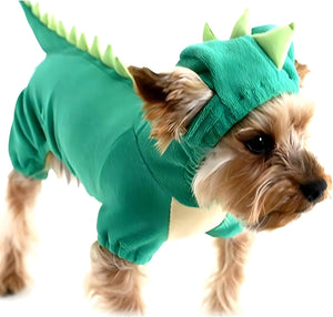 Dog wearing a green dinosaur costume with a hood on a white background at Pet Servo