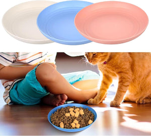 Three pet bowls in beige, blue, and pink with a cat eating from a bowl of food at Pet Servo