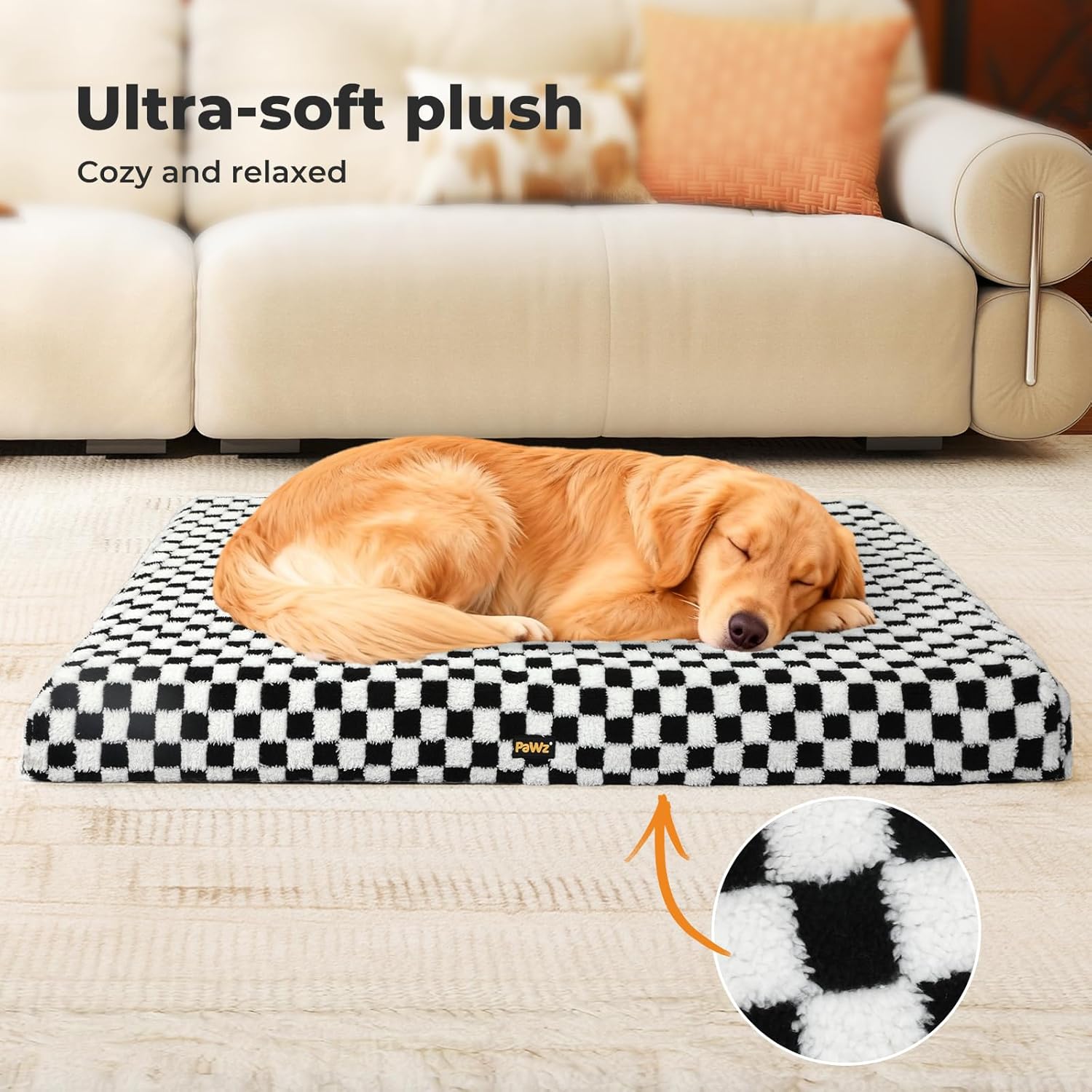 Dog sleeping on a checkered pet bed with ultra-soft plush material, in front of a beige sofa at Pet Servo