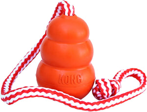 Orange KONG dog toy with red and white rope on a white background at Pet Servo