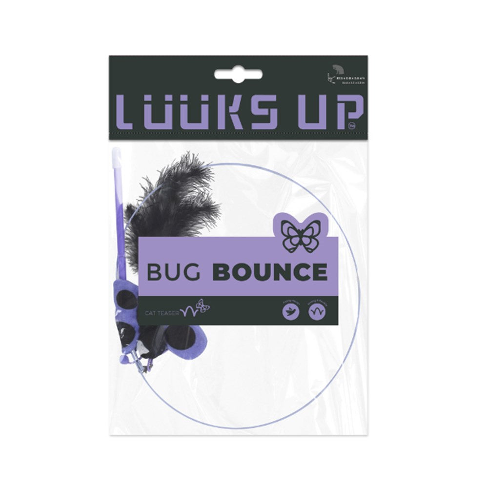 Packaged cat toy labeled 'BUG BOUNCE' by Looks Up, featuring a black feather and purple plastic components inside a clear plastic bag with a dark green and purple header card at Pet Servo