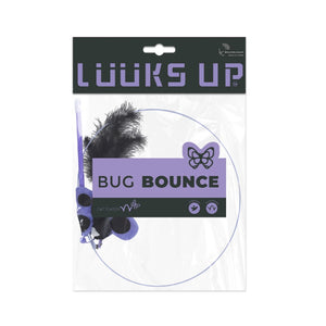 Packaged cat toy labeled 'BUG BOUNCE' by Looks Up, featuring a black feather and purple plastic components inside a clear plastic bag with a dark green and purple header card at Pet Servo
