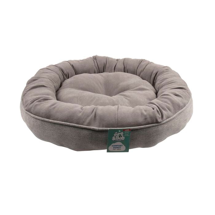 Gray pet bed with a visible brand tag on a white background