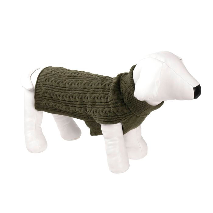 Dog toy wearing a green knitted sweater on a white background