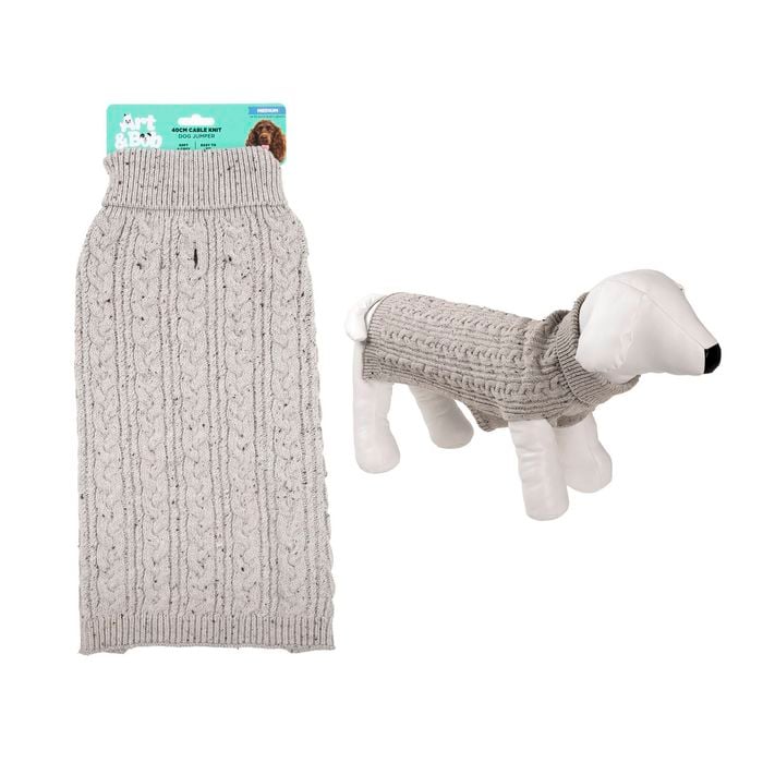 Gray knitted dog sweater with packaging on a white background