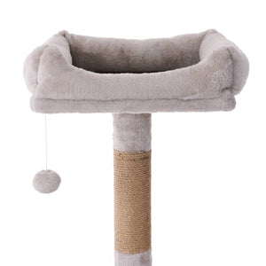 Cat tree with a cushioned platform and scratching post on a white background