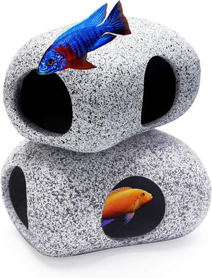 Two gray aquarium rocks with circular holes, each featuring a colorful fish illustration on a white background at Pet Servo