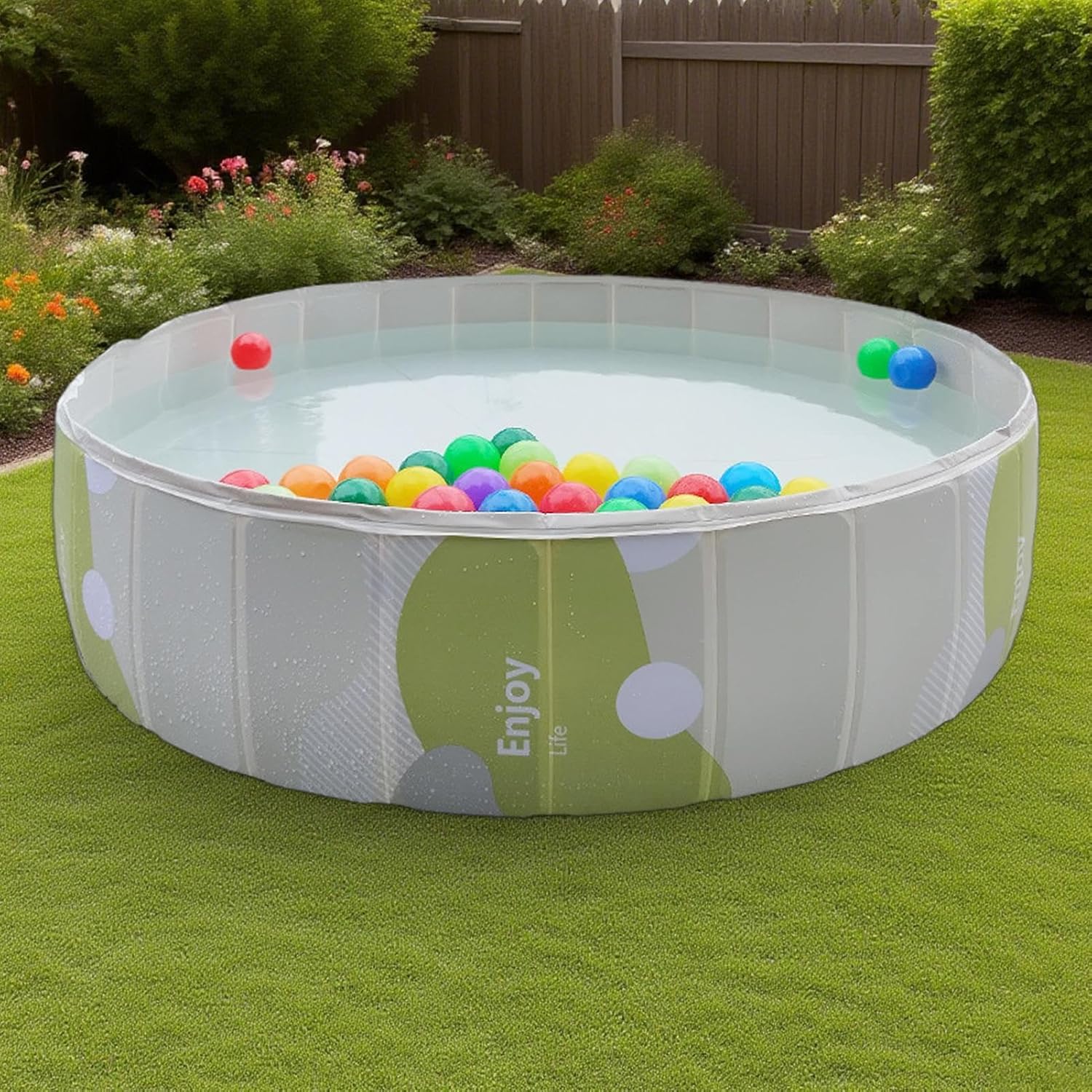 Inflatable pool with colorful balls on a grassy area at Pet Servo