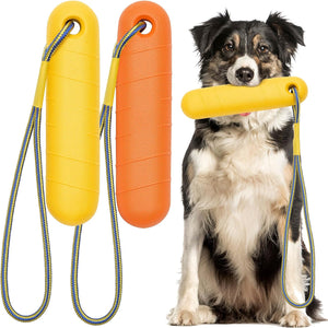 Dog holding a yellow dog toy with two additional toys on a white background at Pet Servo