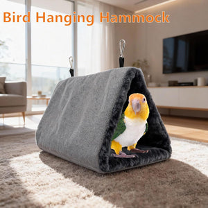Bird hanging hammock with a parrot inside in a living room setting at Pet Servo