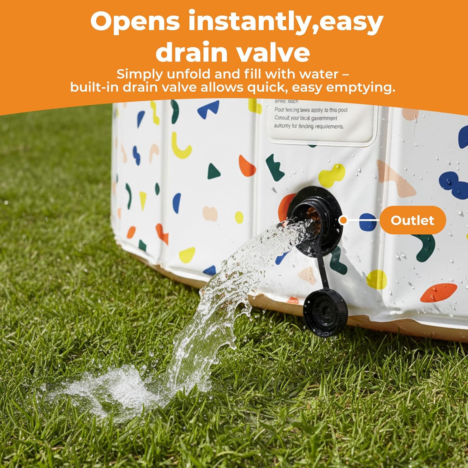 Inflatable pool with built-in drain valve on grass, water flowing out.