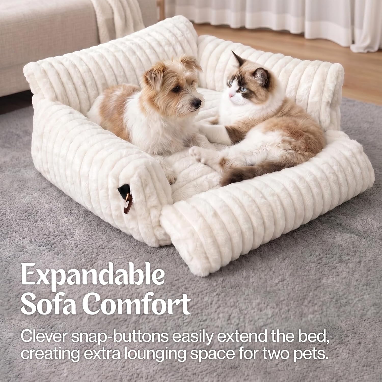 Two dogs on a large white expandable pet bed with text describing its features at Pet Servo