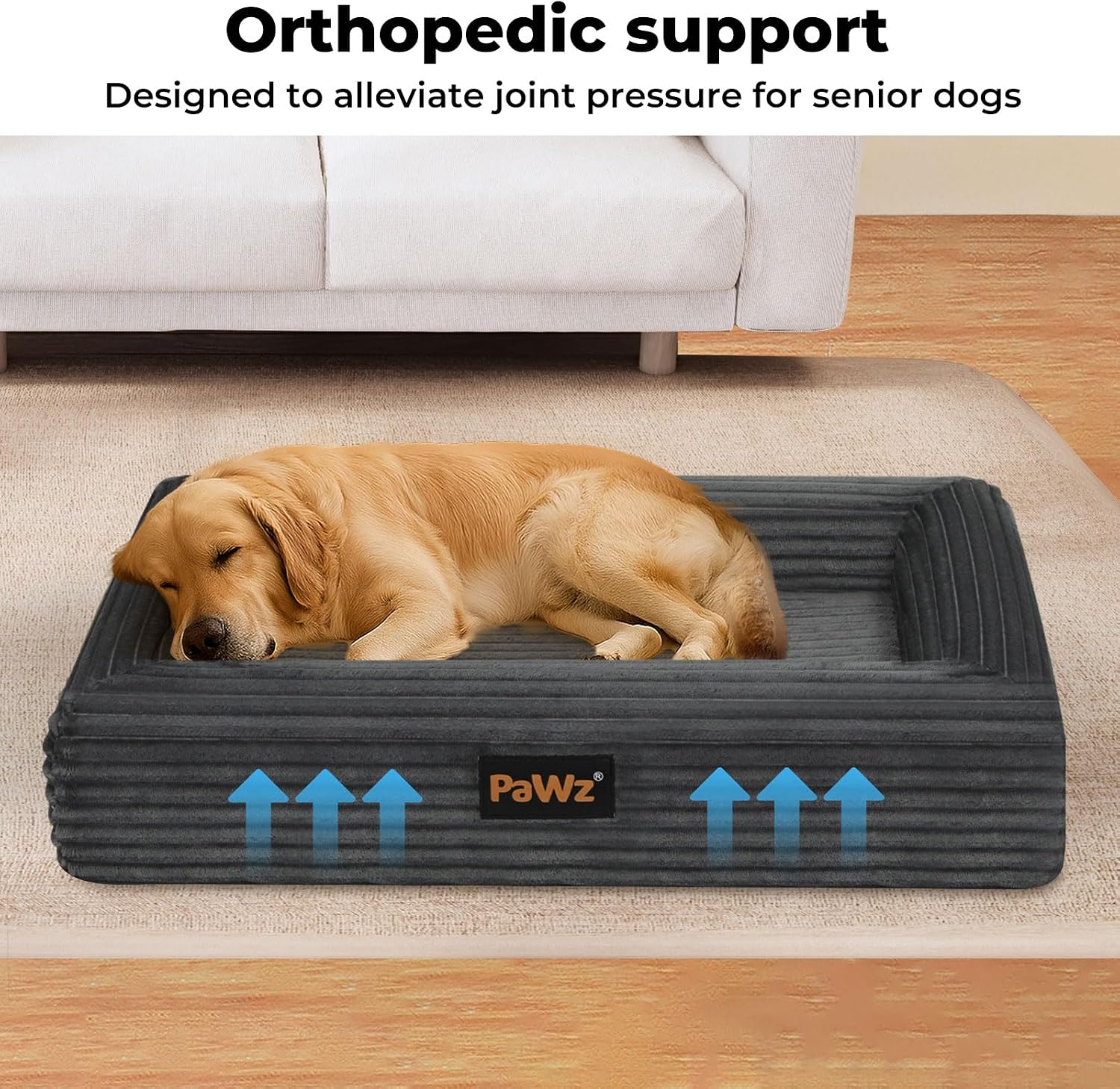 Dog lying on an orthopedic support bed with 'PaWz' branding in a home setting at Pet Servo