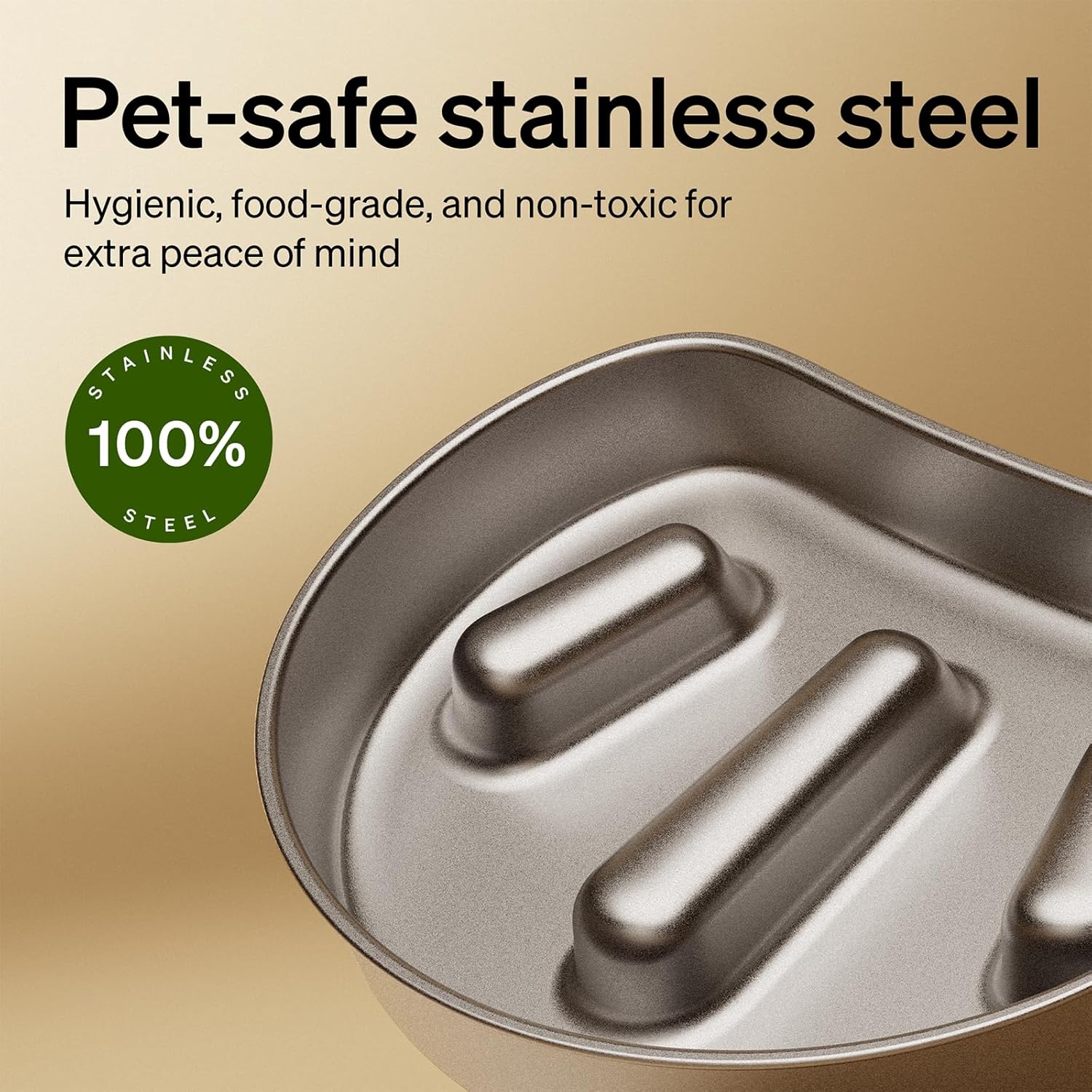 Metal dish with 'Pet-safe stainless steel' text and green label on a beige background
