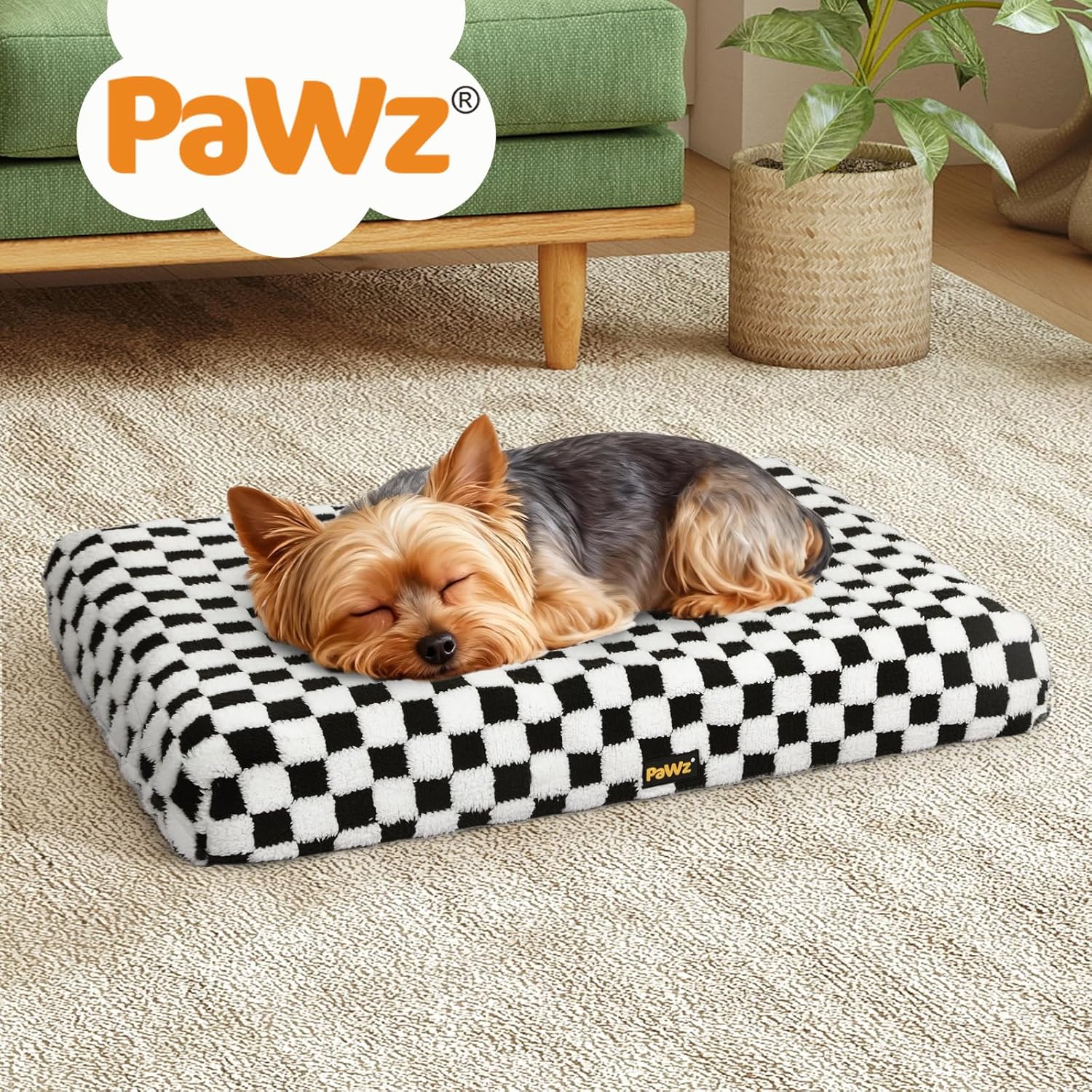 Dog sleeping on a checkered PaWz pet bed in a home setting at Pet Servo