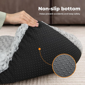 Pet bed with non-slip bottom feature and hand touching it on a carpeted floor at Pet Servo