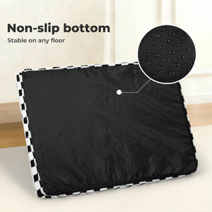Black exercise mat with non-slip bottom and stable design on a light wooden floor at Pet Servo