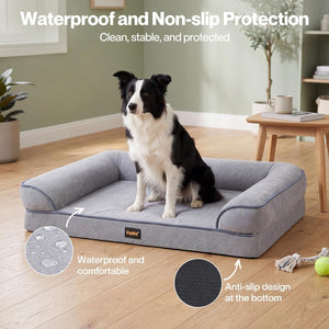 A black and white dog sits on a light gray padded pet bed in a styled room with wood floors, plants, and furniture. White text at the top reads 'Waterproof and Non-slip Protection,' with circular inset callouts showing waterproof texture and anti-slip bottom detail at Pet Servo