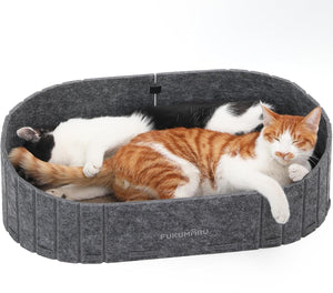 Two cats lying on a gray pet bed with 'Fukumaru' branding at Pet Servo