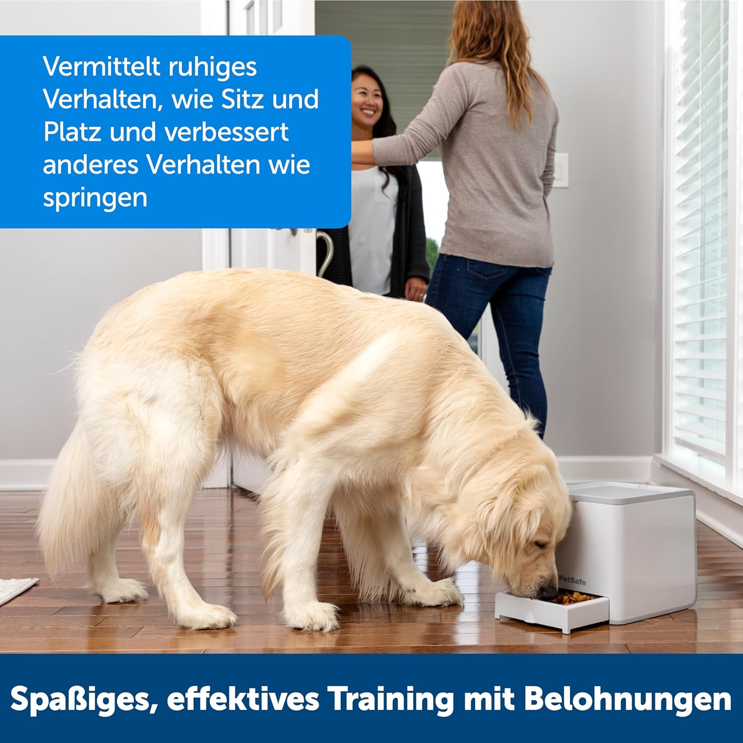 Dog eating from a bowl with two people in the background, text overlay in German at Pet Servo