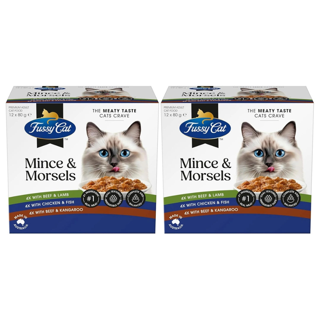 Two boxes of Fussy Cat Mince & Morsels cat food on a white background