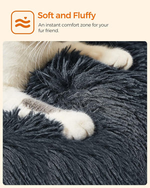 Cat lying on a fluffy dark gray pet bed with 'Soft and Fluffy' text and branding at Pet Servo