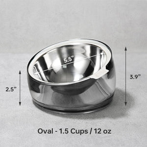 A stainless steel pet bowl shown on a light gray textured background with overlaid dimension arrows and text indicating oval shape, 1.5 cups / 12 oz capacity, and measurements of 5 at Pet Servo