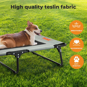 Dog lying on a portable pet bed with 'Pawz' branding on grass, featuring text about high-quality teslin fabric at Pet Servo