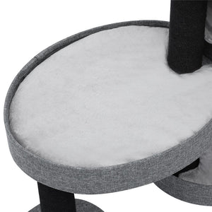 Close-up of a gray cushioned stool with a white seat pad on a white background at Pet Servo