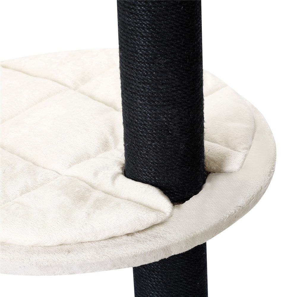 Close-up of a cat tree with a black post and white cushioned platform at Pet Servo