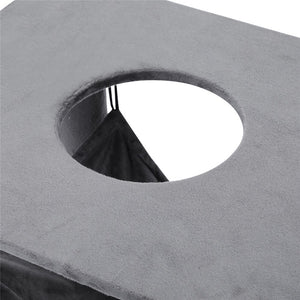 Close-up of a gray concrete block with a circular hole at Pet Servo