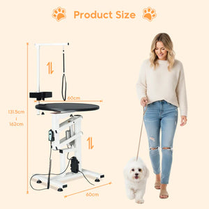 Pet grooming table with dimensions and a woman walking a dog on a leash at Pet Servo