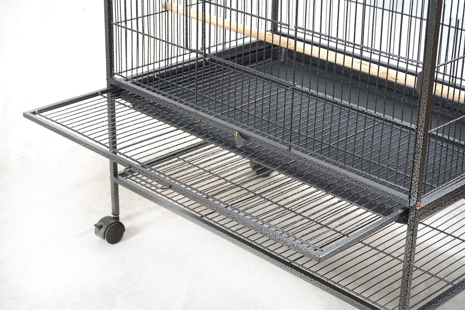 Large metal bird cage on wheels with multiple levels on a white background at Pet Servo