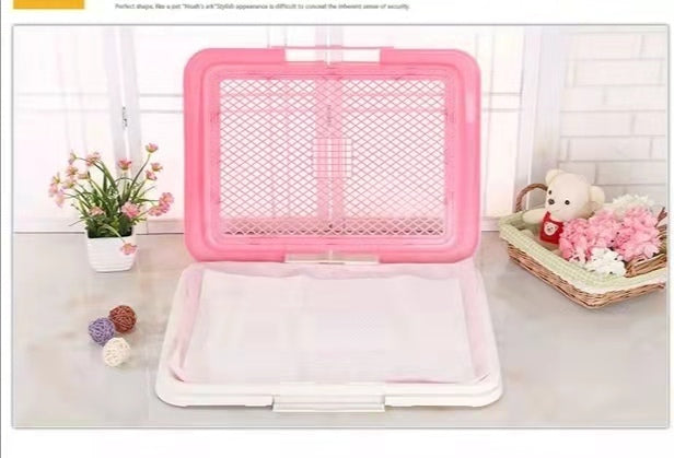 Pink mesh screen on a white surface with decorative items in the background at Pet Servo