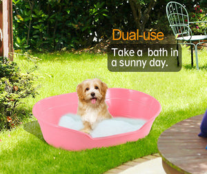Dog in a pink inflatable pool with bubbles on a grassy area, text 'Dual-use Take a bath in a sunny day at Pet Servo