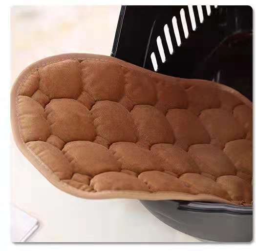 Brown quilted pot holder on a white surface at Pet Servo