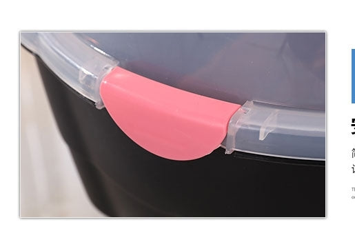 Pink and clear plastic lid with a handle on a black container at Pet Servo
