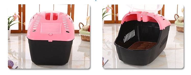 Black and pink pet carrier on a wooden floor with a floral arrangement in the background at Pet Servo