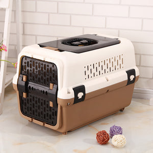 Pet carrier with decorative balls on a light-colored floor at Pet Servo