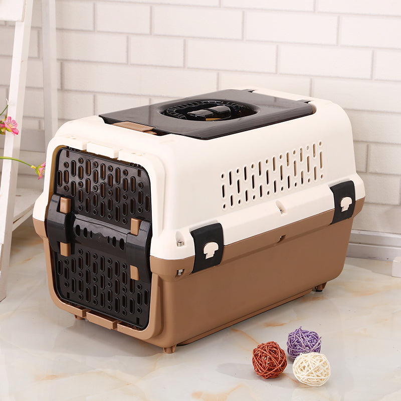 Pet carrier with decorative balls on a light-colored floor at Pet Servo