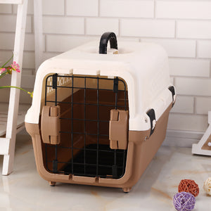 Pet carrier with beige and white exterior on a light wooden floor at Pet Servo