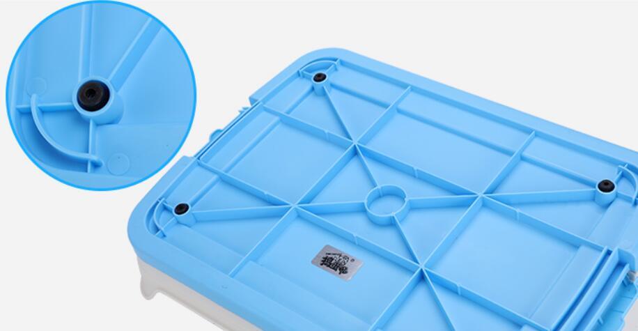 Blue plastic component with grid pattern and circular holes on a white background at Pet Servo